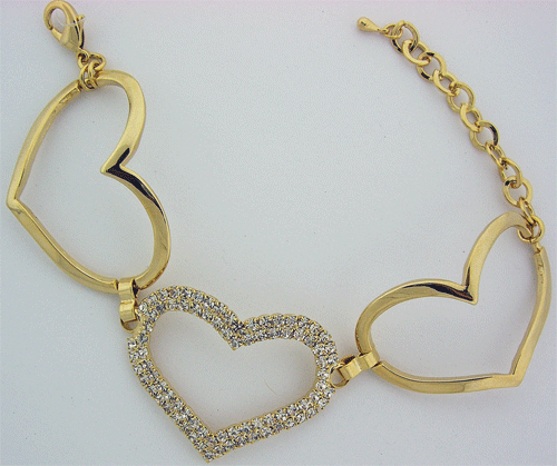 A close-up view of the glowing Golden Heart Swarovski Bracelet showcasing its precision crystal cuts