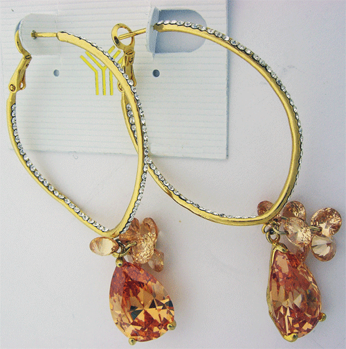 Gold Toned earrings with Champaign Swarovski crystals hanging elegantly