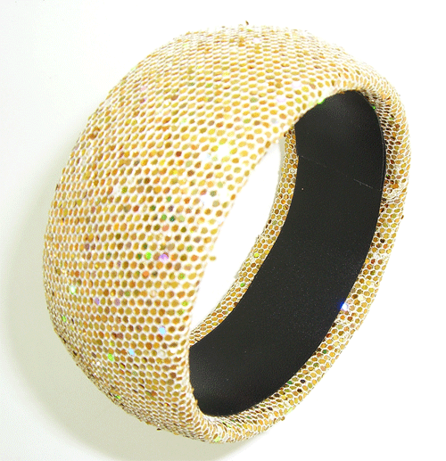 Detailed view of the Shiny Golden Bracelet showcasing intricate craftsmanship and sparkling fabric material