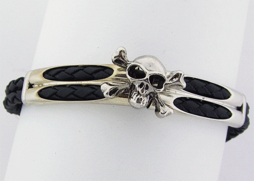 Black rubber unisex wristband bracelet featuring a prominent silver-tone skull design