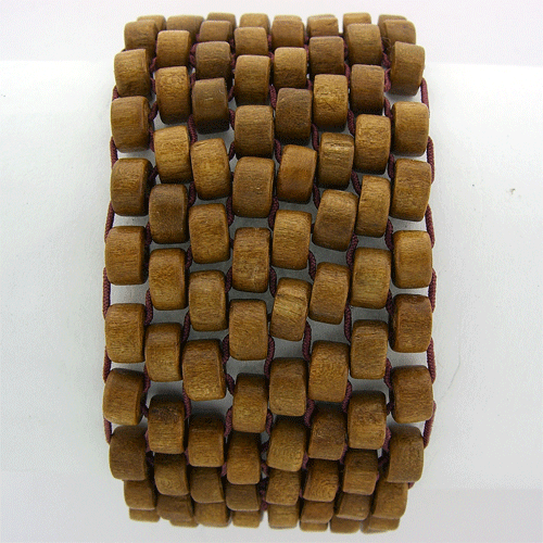 Handcrafted natural brown wooden stretch bracelet perfect for tropical summer fashion