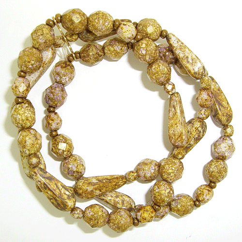 Close-up of the Beige Natural Gemstone Bracelet with natural sparkles showcasing its three-layer stretch design