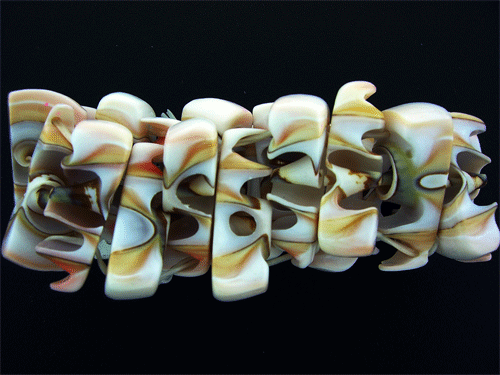 Detailed view of the Pink and White Natural Sea Shell Stretch Bracelet showcasing natural patterns