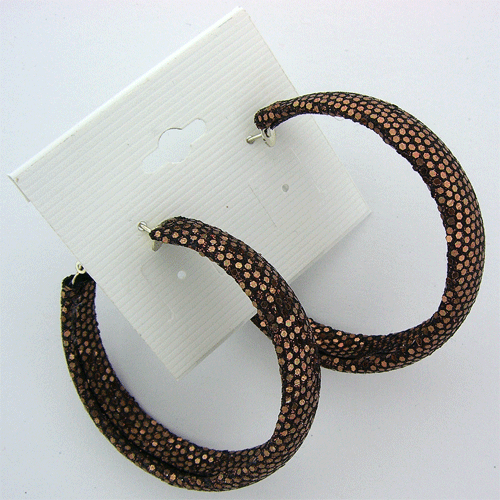 A pair of beautifully crafted brown shiny round earrings showcasing elegant design and rich historical context