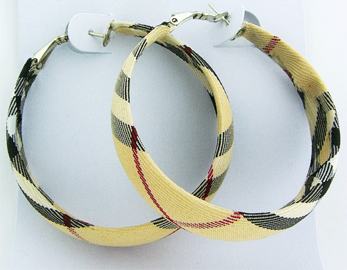 Close-up of Beige Burberry-style medium hoop earrings featuring classic plaid fabric covering