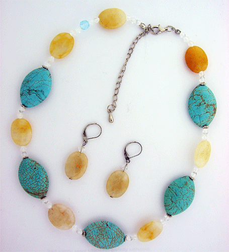 Close-up of the exquisite turquoise and beige natural stone necklace showcasing detailed craftsmanship