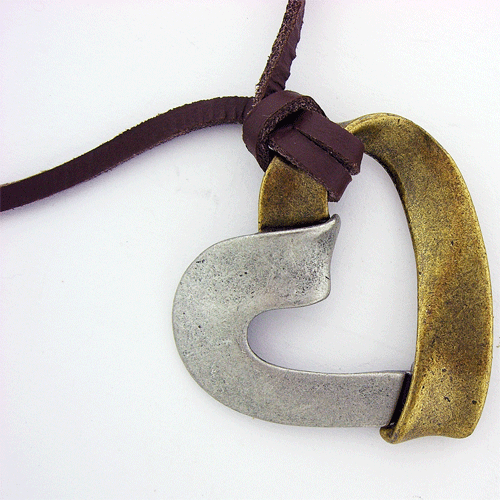 Brown leather necklace featuring a distinctive gold and silver tone heart pendant