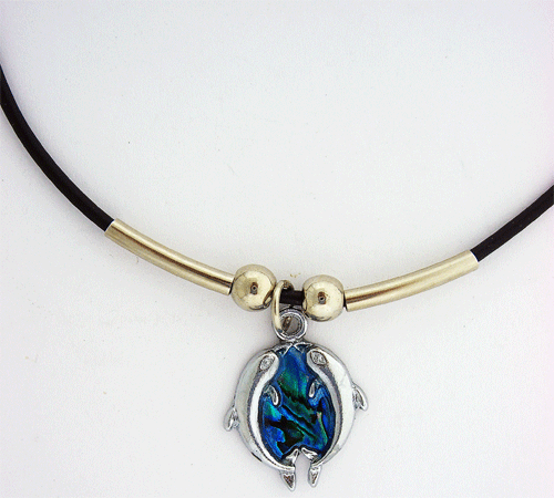 Close-up of the Two Kissing Dolphin Charm Necklace showcasing the detailed silver pendant on a black rubber cord