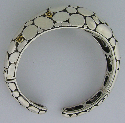Detailed view of the Sterling Silver Bangle Bracelet with 14k gold flowers
