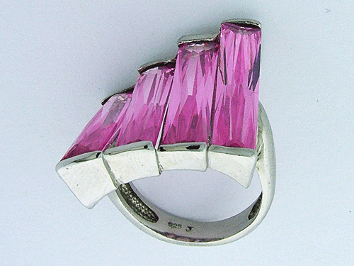 Elegant 925 Sterling Silver Ring featuring four rectangular pink cubic zirconias on a clean background