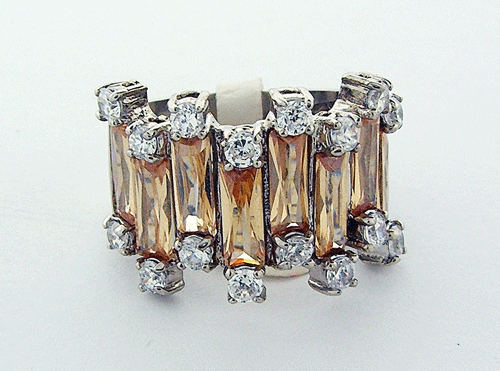 A detailed view of the Sterling Silver Champagne Ring featuring clear CZs on the sides