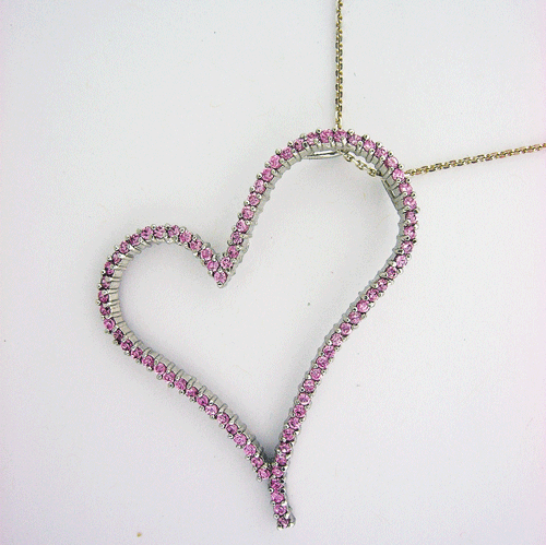 Close-up of the elegant Pink Sapphire Heart Pendant showing detailed sterling silver craftsmanship