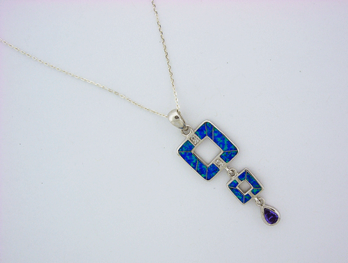 A beautiful Sterling Silver Blue Opal and Purple Amethyst Pendant