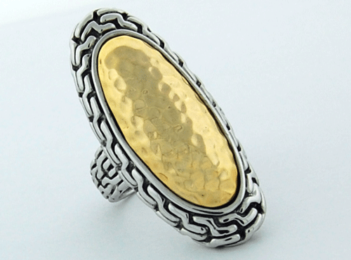 Exquisite Sterling Silver and 14k Yellow Gold Oval Ring on display