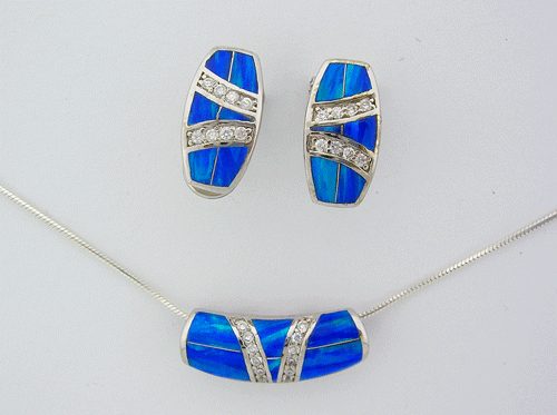 A premium sterling silver Blue Opal Pendant with matching earrings featuring simulated diamonds and beautiful opalescence