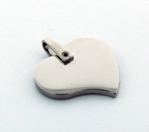 Silver engravable stainless steel heart pendant necklace resting on a neutral background