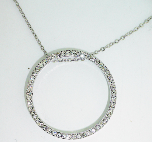 A brilliant round clear crystal pendant jewelry featuring a 10 inch silver-tone necklace.