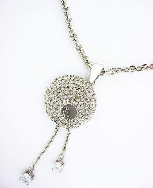 Beautiful Round Clear Swarovski Crystal Pendant on a silver-toned necklace chain, showcasing intricate craftsmanship and brilliant light dispersion.