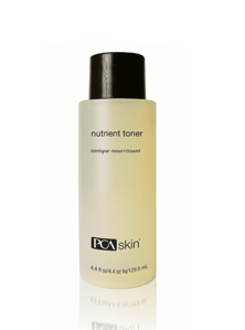 Detailed view of the Nutrient Toner (pHaze 5) bottle highlighting the clear liquid formula and elegant product label design