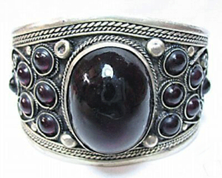 Exquisite Tibet Tribal silver cuff bracelet featuring a large faceted dark brown jade centerpiece