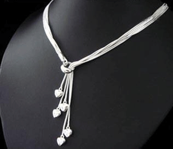 Handcrafted 18-inch 925 Sterling Silver Five Heart Tag Necklace displaying brilliant white luster and five delicate heart pendants