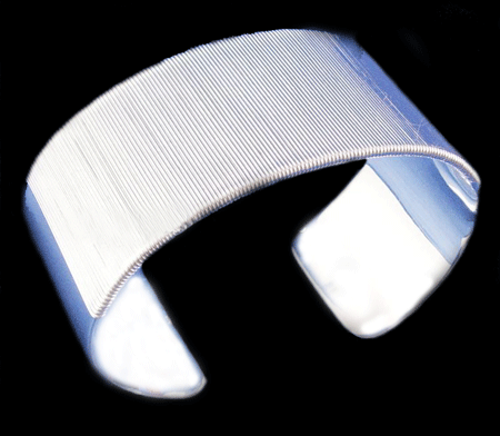 Detailed view of the Sterling Silver Wide Cuff Bangle Bracelet highlighting its craftsmanship and 925 purity