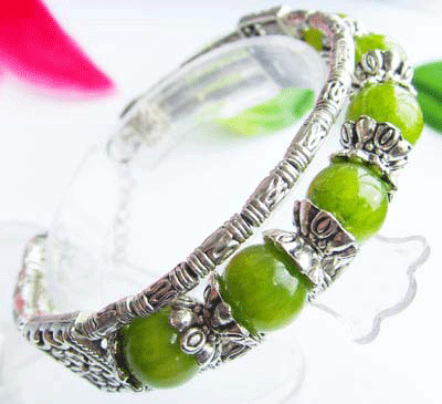 Detailed view of the Marvelous Green Jade Bracelet featuring Tibet Silver and jade beads