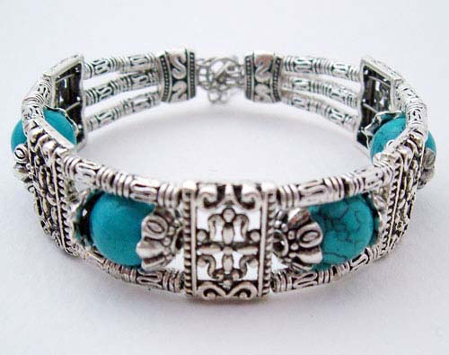 Handcrafted Tibet Silver Turquoise Bracelet featuring four round sky-blue natural beads
