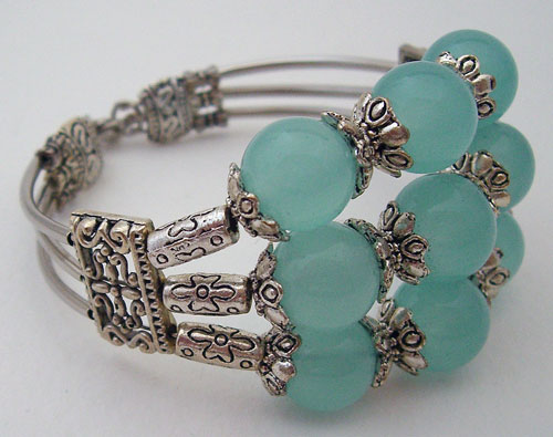 Tibet Silver Light Blue Bracelet adorned with 9 elegant light blue beads