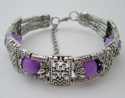Purple Tibet Silver Bracelet with 4 intricate purple beads and an adjustable clasp