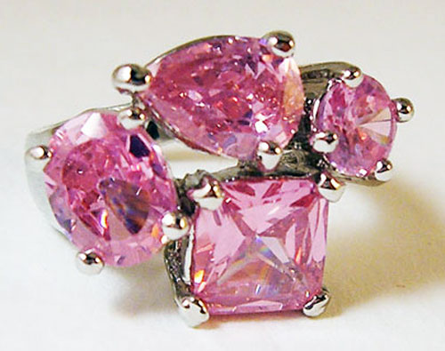 Vintage style Lavender Pink Crystal Ring featuring four precision-cut gemstones on a silver-tone band