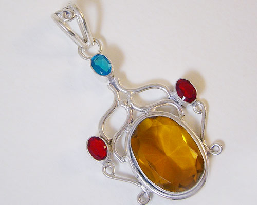 Large oval yellow citrine 925 sterling silver pendant with garnet and blue topaz accents