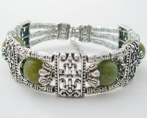 Exotic Tibet Silver Green Jade Bracelet showcasing four elegant jade beads