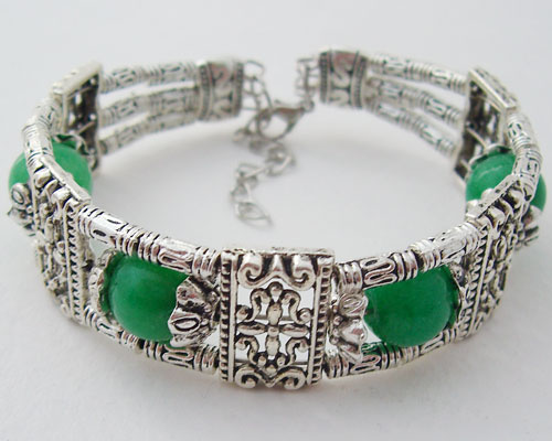 Authentic Green Jade Tibet Silver Bracelet showing intricate silver details and rich green jade beads