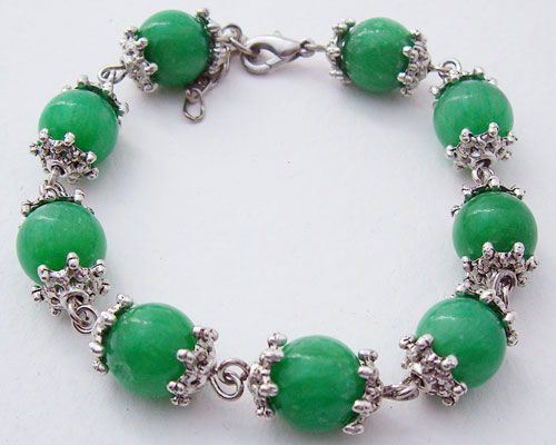 Detailed view of the Green Jade Beaded Tibet Silver Bracelet with adjustable clasp