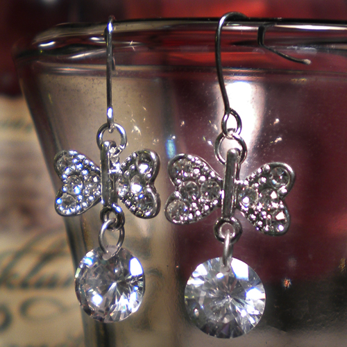 Sterling Silver Crystal Rhinestone Bow Earrings displaying perfect sparkles
